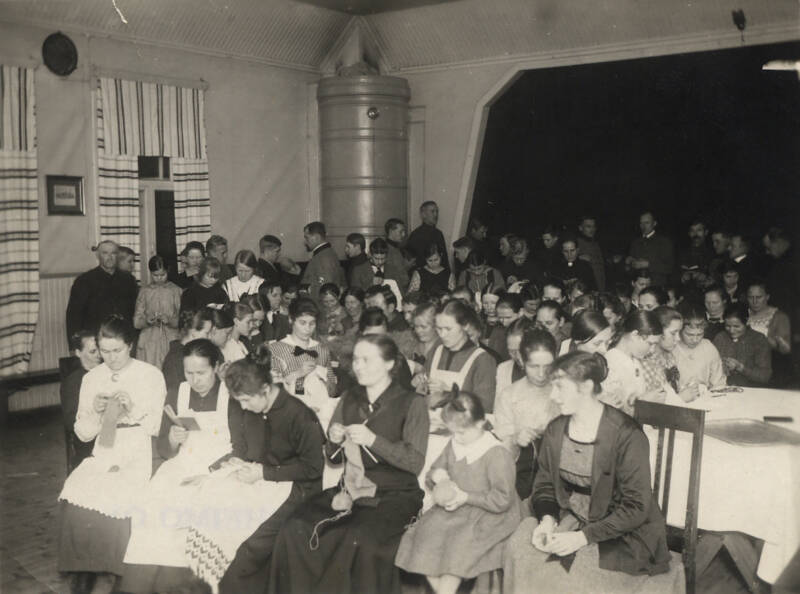 A sewing bee at Launoinen National House.