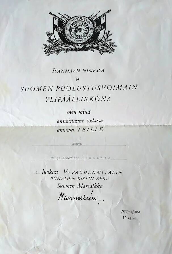 Todistus I luokan Vapaudenmitalin punaisen ristin kera saannista vuonna 1944.